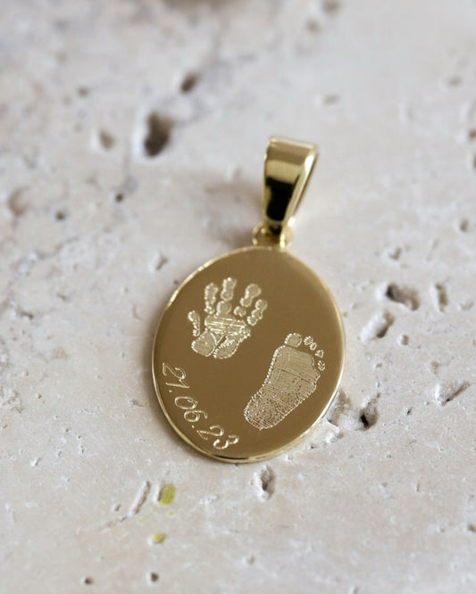 Your Little One's Footprints Necklace